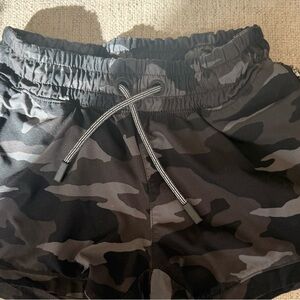 Athleta Girl All Play 3" shorts in a black and gray camo print